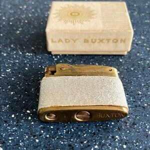 Vintage Lady Buxton Goldtone  with silver leather wrap cigarette Lighter
